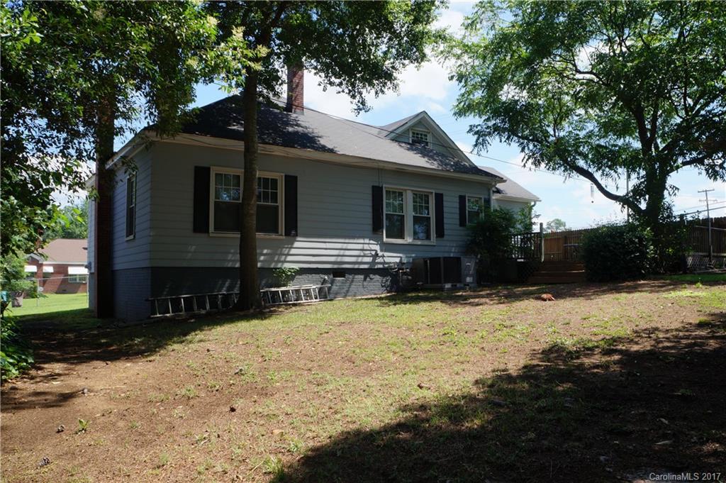 1396 Springdale Road, Unit 4/A Lancaster, SC 29720 - Photo 8 of 23 a front view of house with yard and trees in the background