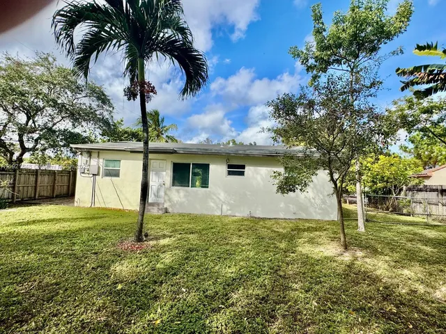 a house view with a garden space