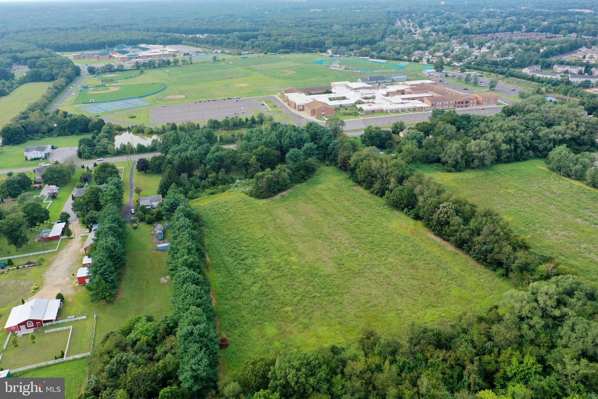 632 Clayton Road Williamstown, NJ 08094 - Photo 2 of 18 a view of a lake with a yard