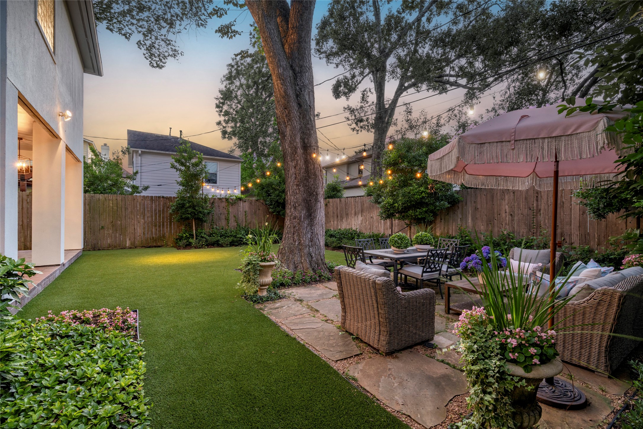 4220 Riley Street West University Place, TX 77005 - Photo 19 of 35 Impressively oversized backyard. The current owners upgraded the AC compressors to 'slim line' units. Both are now located in the west side yard away from the private backyard. This brilliant improvement keeps the vibe of tranquility and peacefulness in this grand outdoor space.