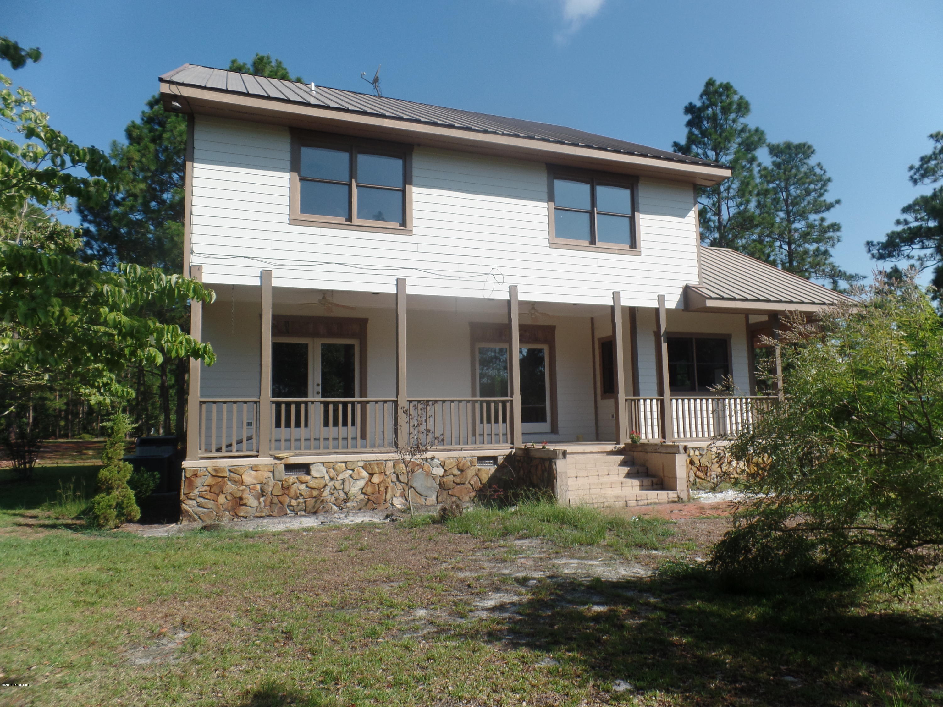 438 Bay Ridge Road Harrells, NC 28444 - Photo 1 of 20 front view
