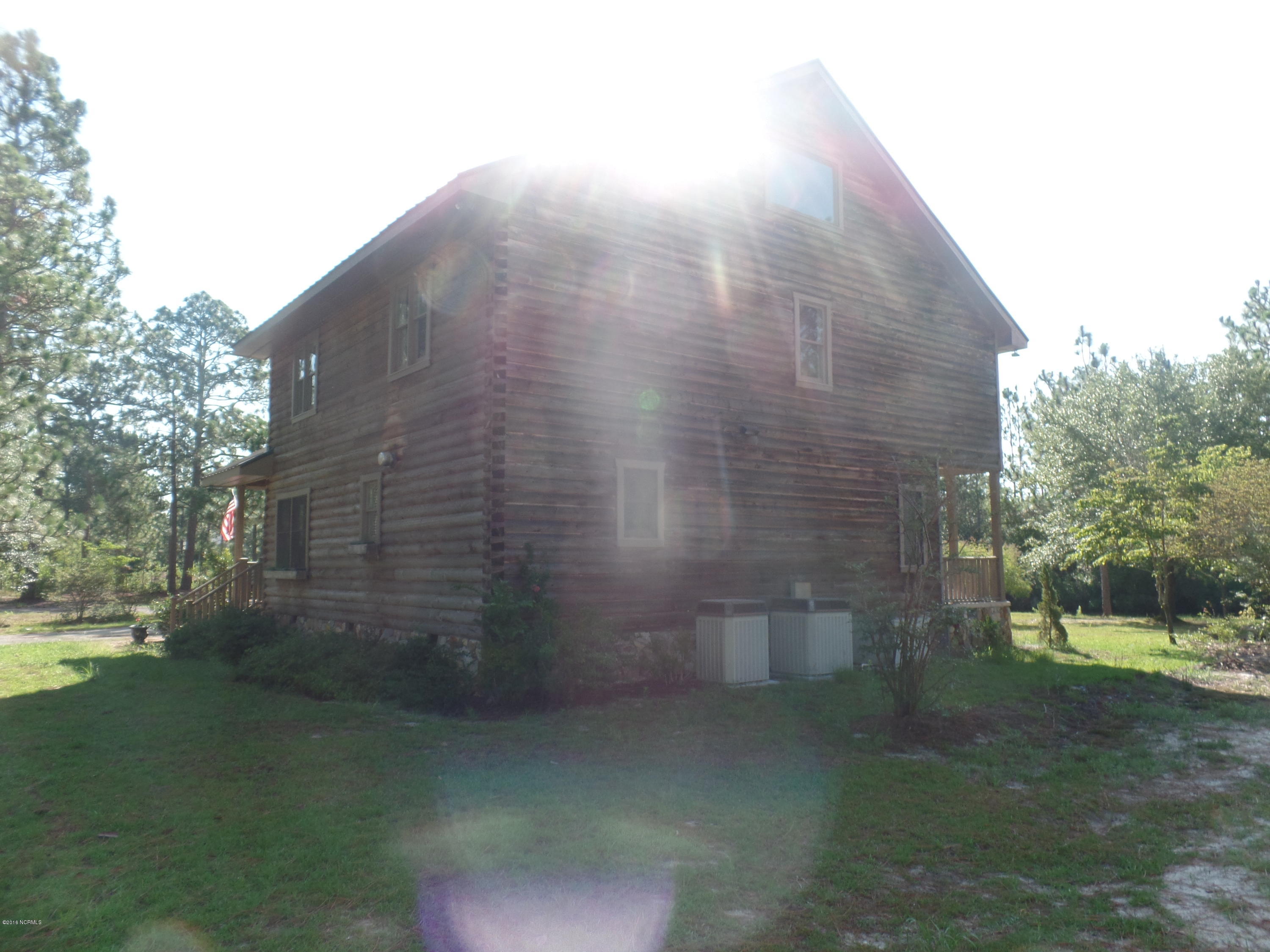 438 Bay Ridge Road Harrells, NC 28444 - Photo 5 of 20 left side rear