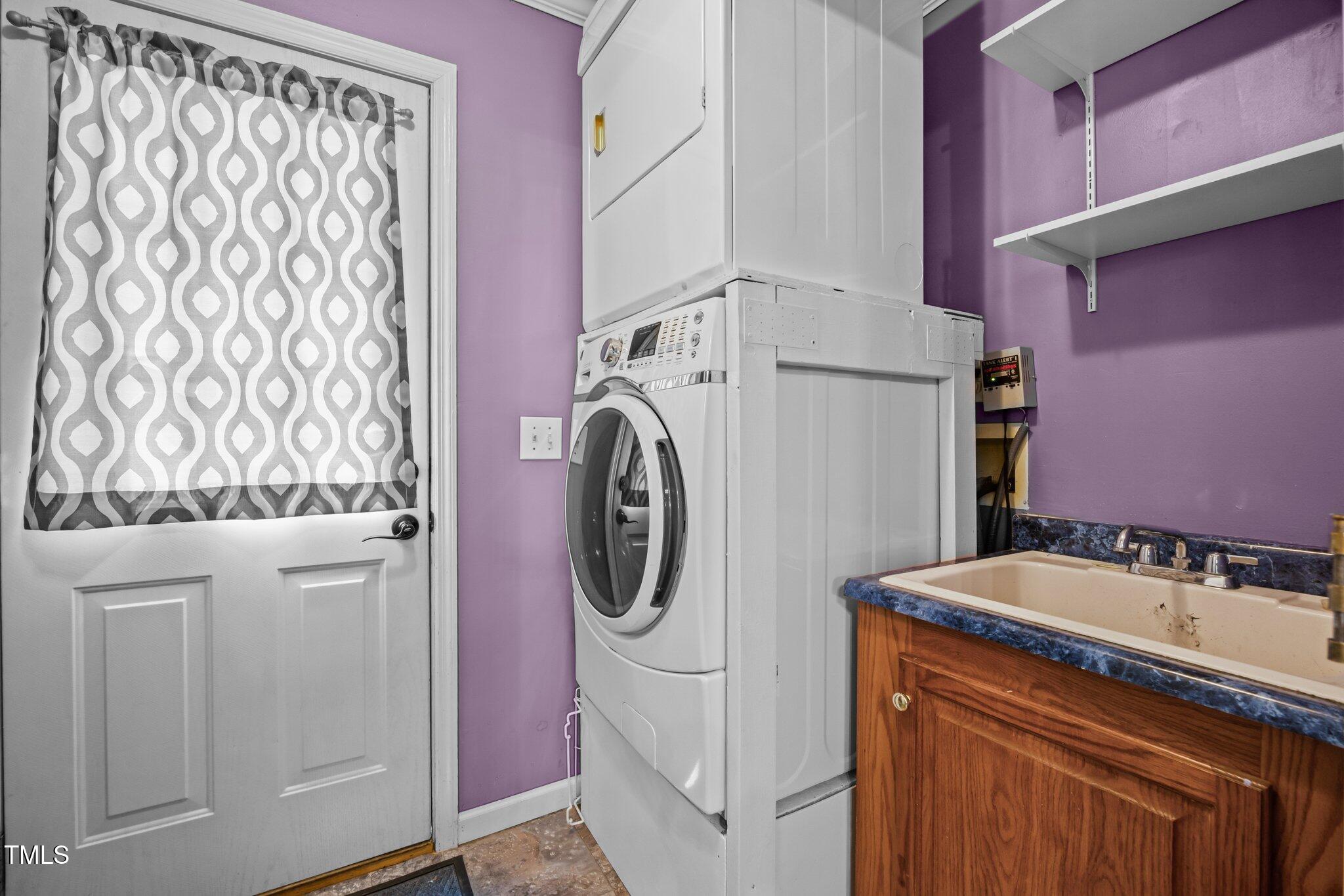 117 Lema Drive Garner, NC 27529 - Photo 16 of 34 a utility room with dryer and washer