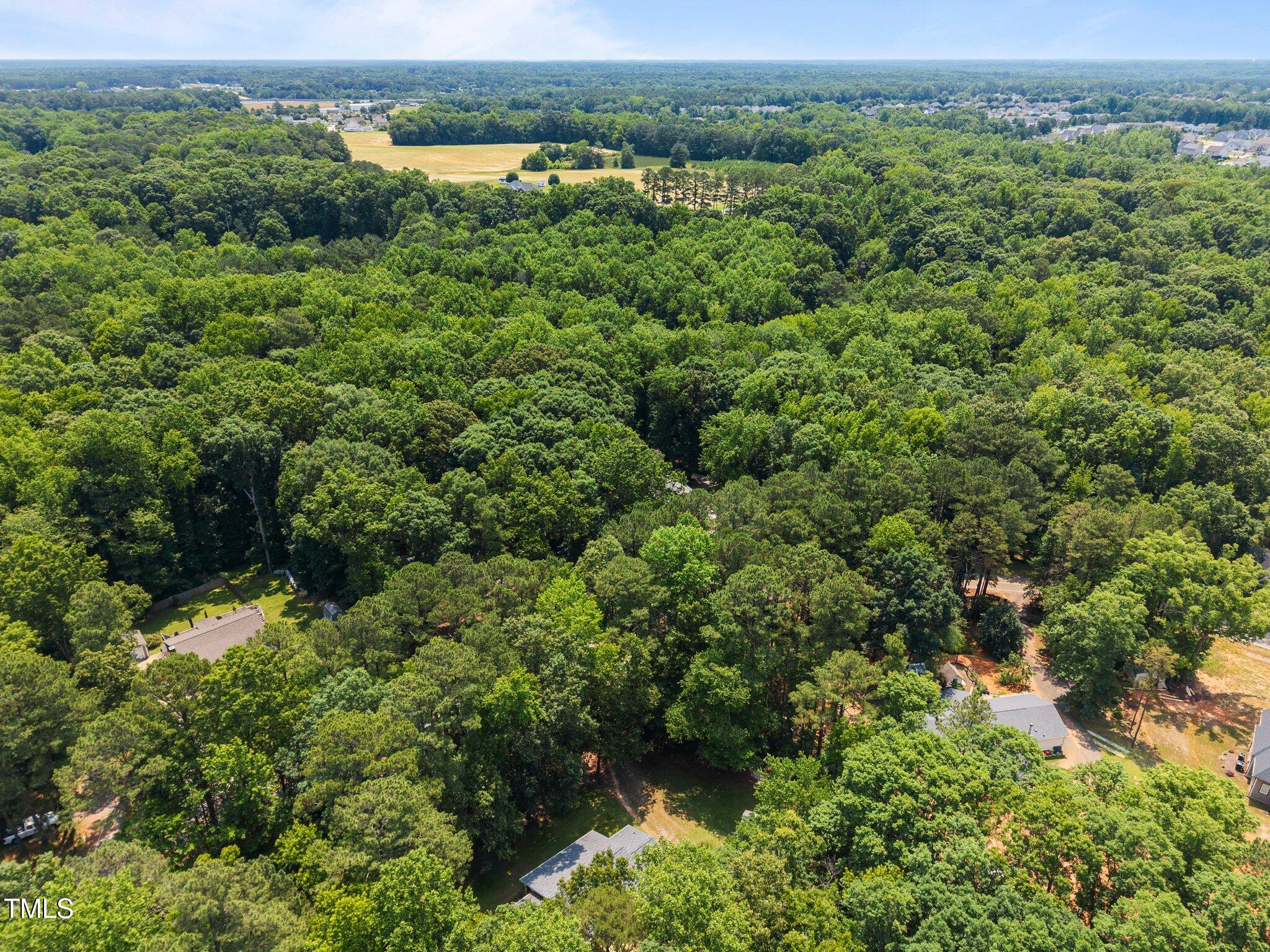 117 Lema Drive Garner, NC 27529 - Photo 28 of 34 an aerial view of a houses with a yard