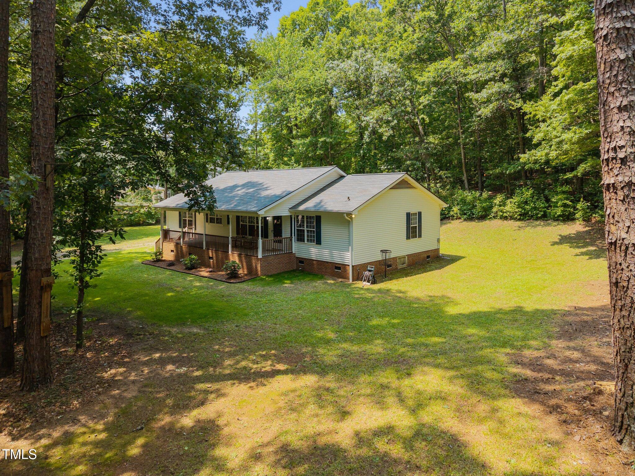 117 Lema Drive Garner, NC 27529 - Photo 33 of 34 a view of a house with a yard and sitting area