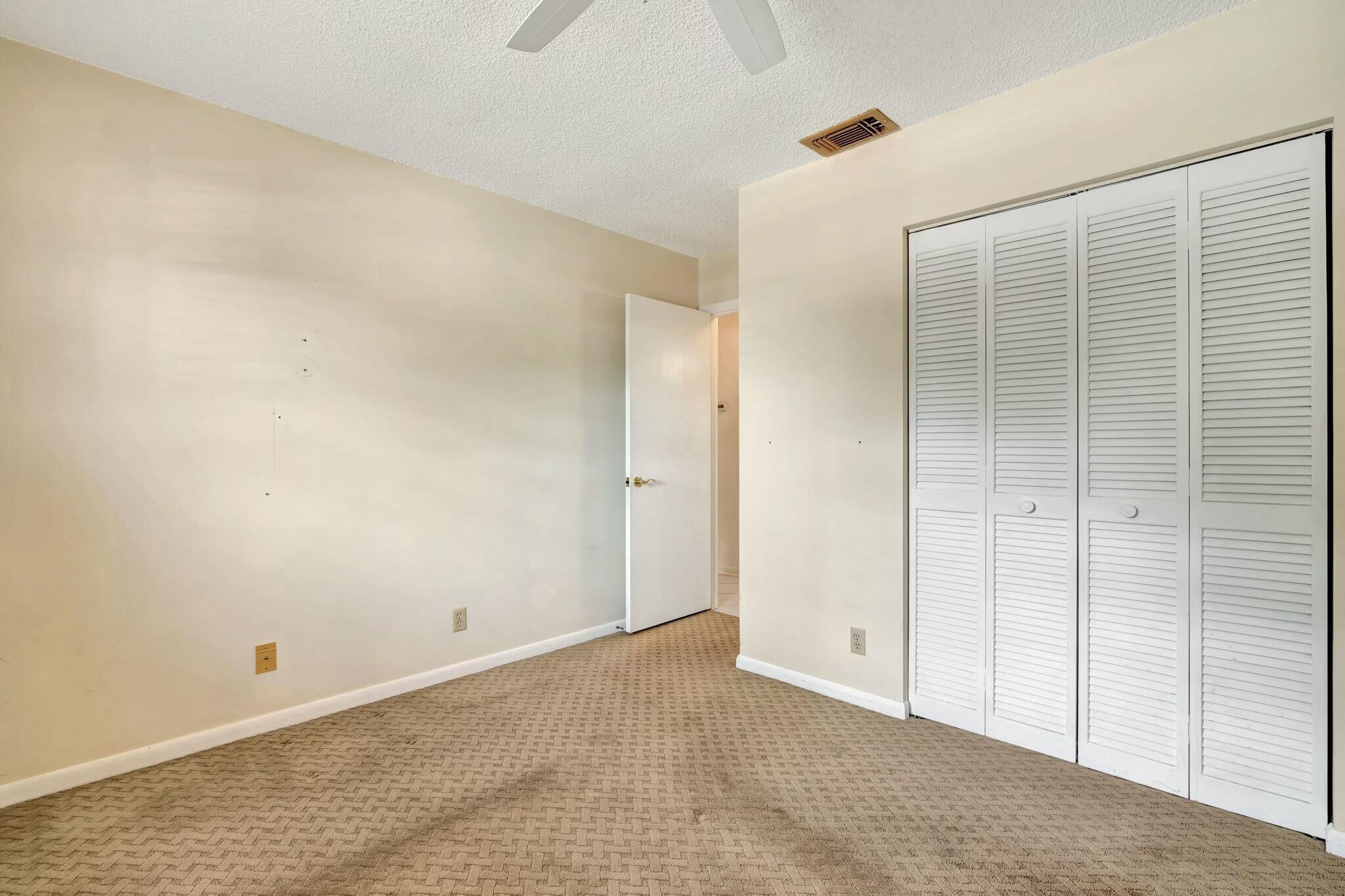 126 Greentree Circle Jupiter, FL 33458 - Photo 12 of 24 Guest bed