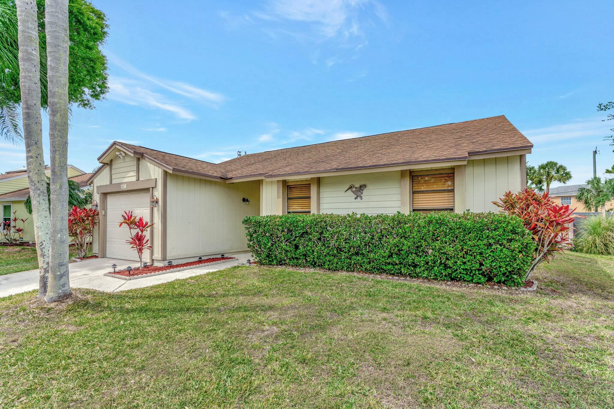126 Greentree Circle Jupiter, FL 33458 - Photo 2 of 24 Front