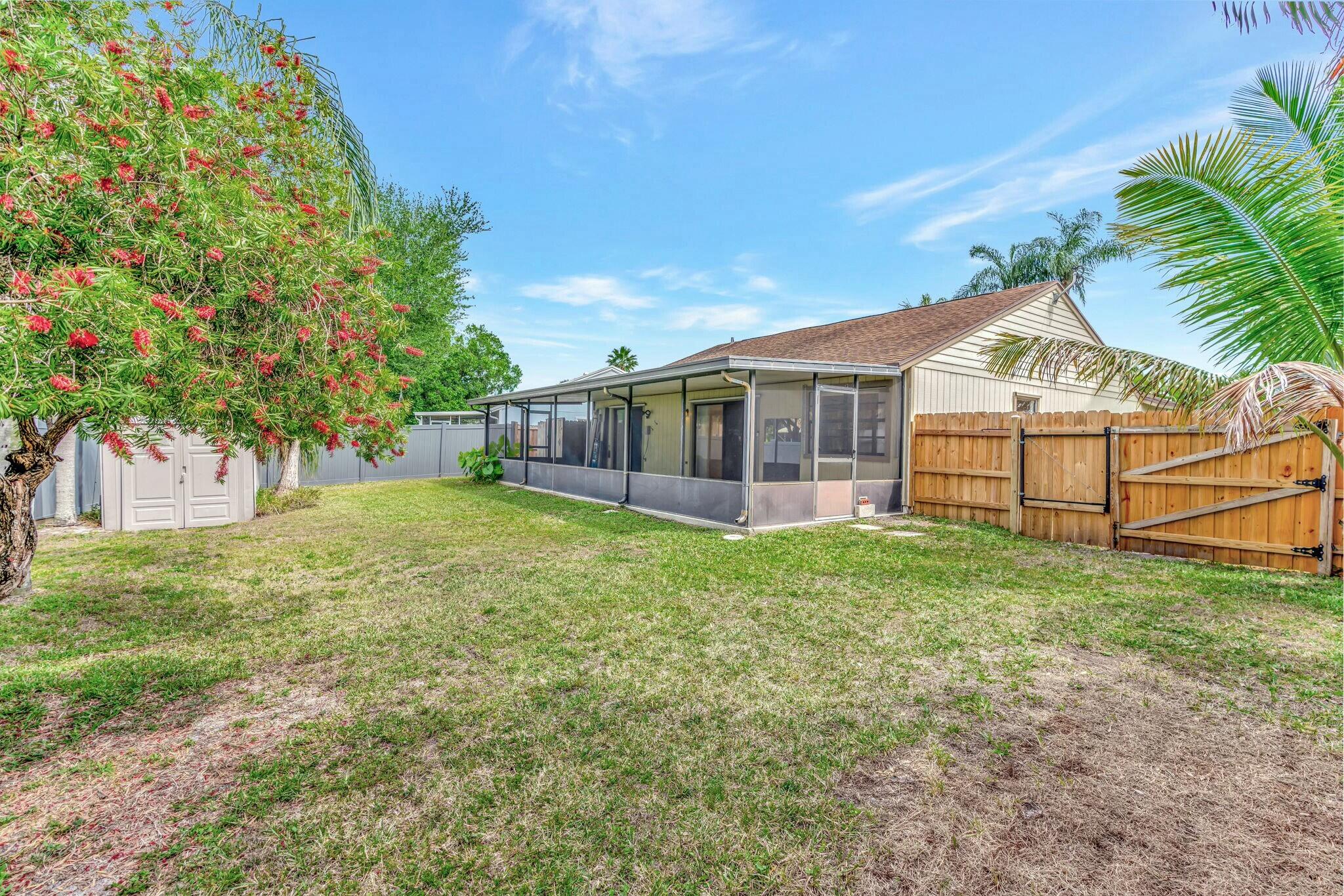 126 Greentree Circle Jupiter, FL 33458 - Photo 21 of 24 Back Yard