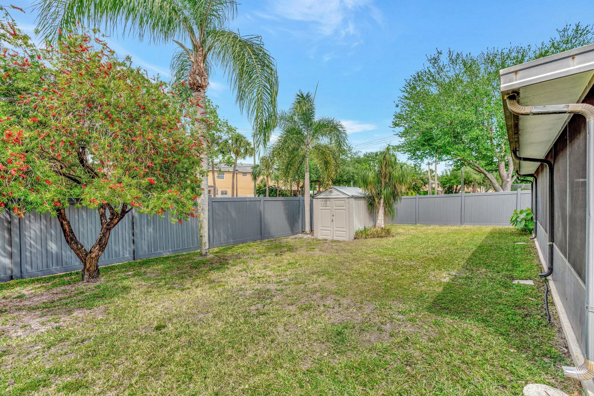126 Greentree Circle Jupiter, FL 33458 - Photo 22 of 24 Back Yard
