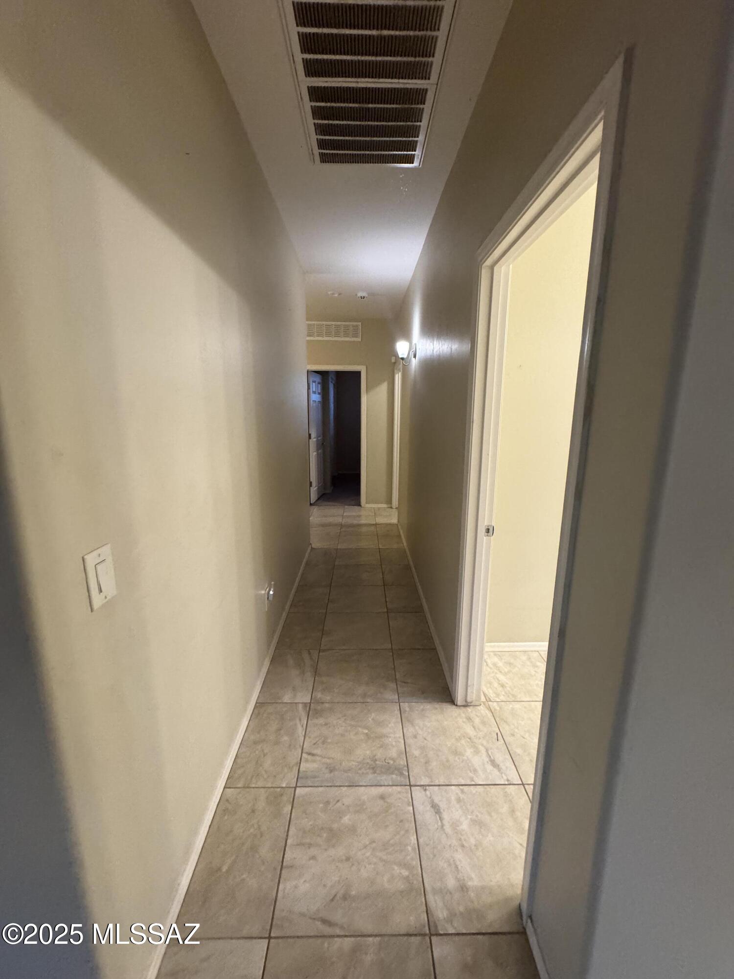 8697 West Denstone Road Marana, AZ 85653 - Photo 12 of 21 2nd hallway going to the bedrooms and bathrooms.