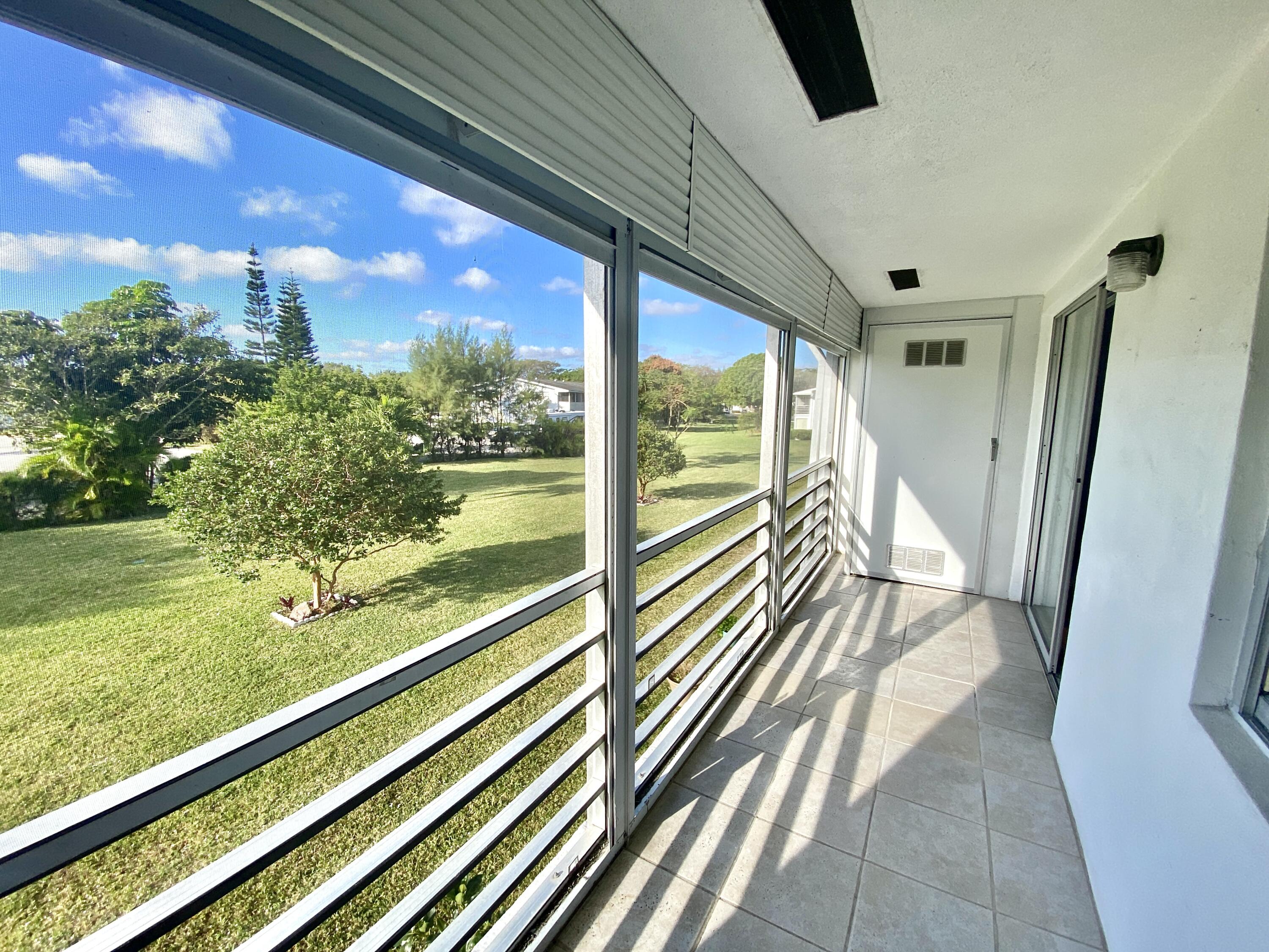 374 Markham Q Deerfield Beach, FL 33442 - Photo 23 of 57 Rear View of Garden
