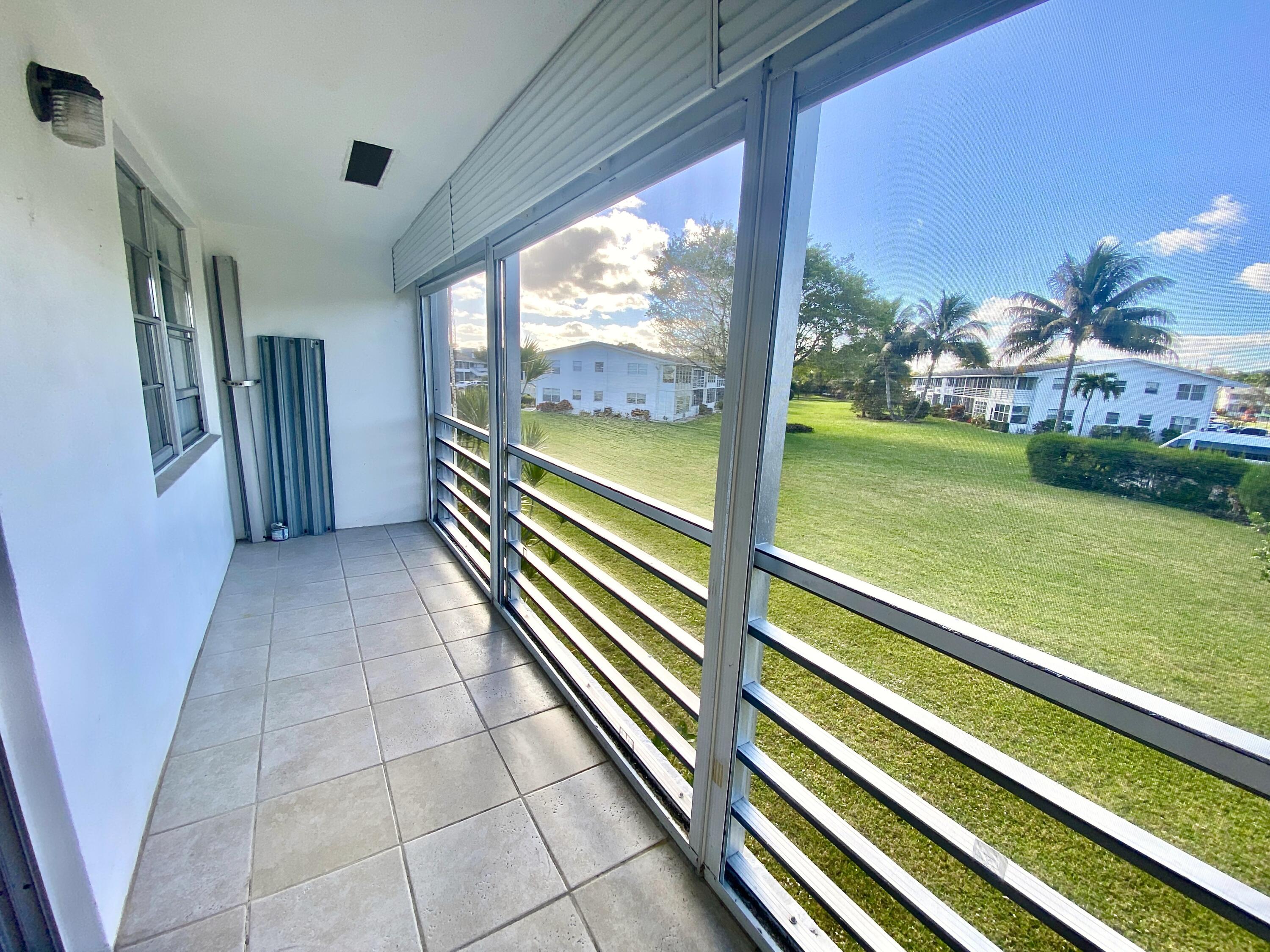 374 Markham Q Deerfield Beach, FL 33442 - Photo 25 of 57 Rear View of Garden