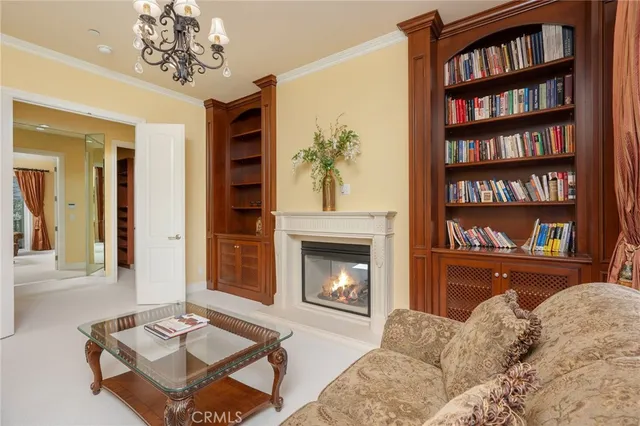 a spacious bathroom with a double vanity sink a mirror a bathtub and a window