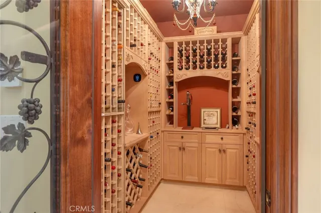 a kitchen with stainless steel appliances granite countertop a stove a sink and a wooden floors