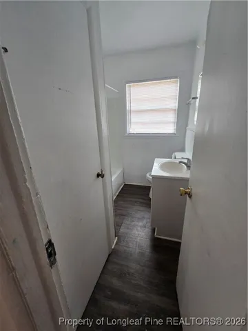 a bathroom with a sink and a bathtub