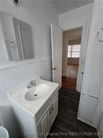 a bathroom with a sink and a bathtub