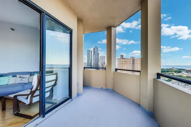 a view of a hardwood floor in a room