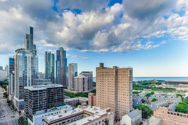 a view of city with tall buildings