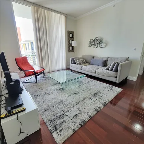 a living room with furniture and a couch