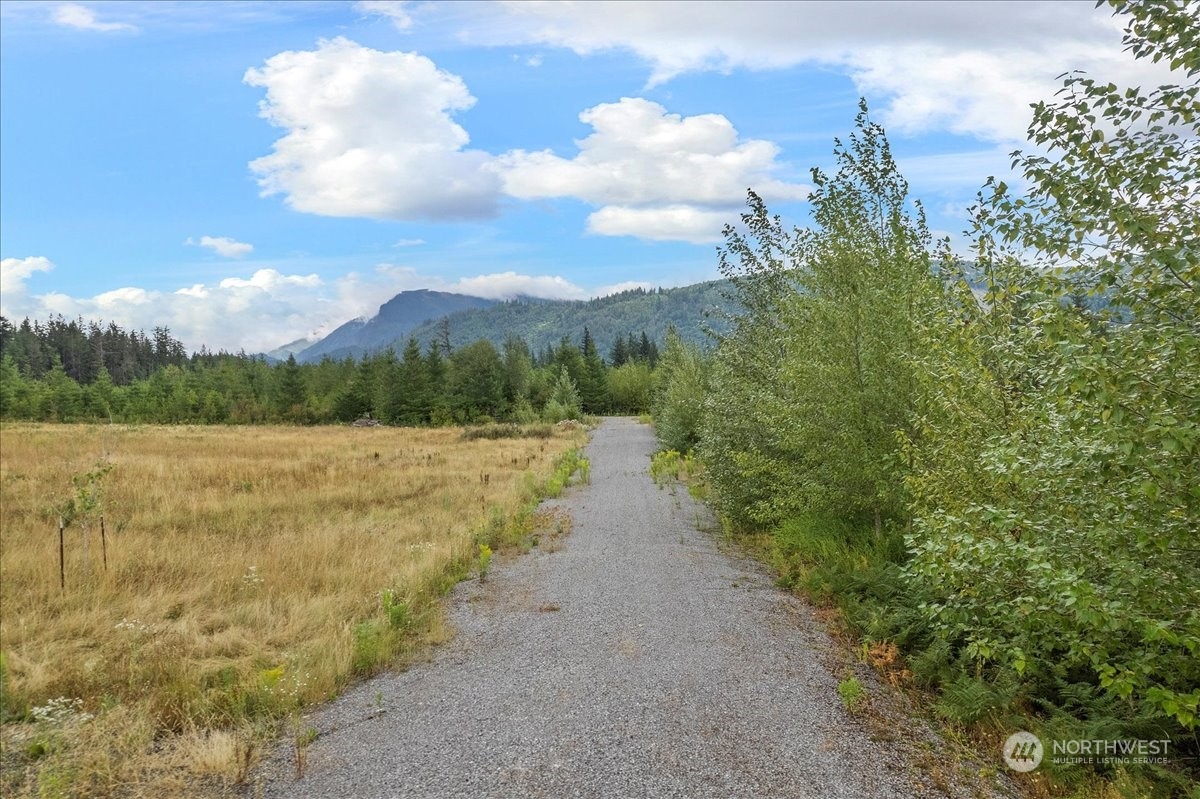 9250 Heady Road Sumas, WA 98295 - Photo 6 of 7 a view of a lake with houses in the back