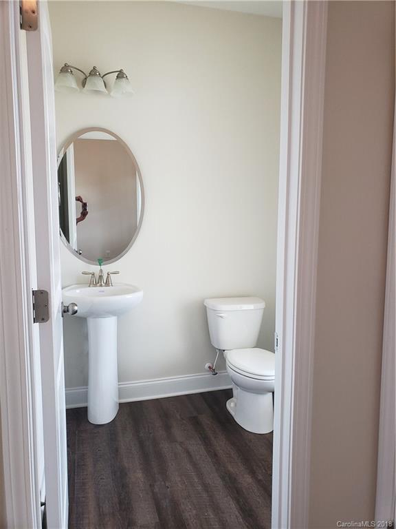 4220 Sincerity Road, Unit 4 Monroe, NC 28110 - Photo 20 of 23 a bathroom with a toilet