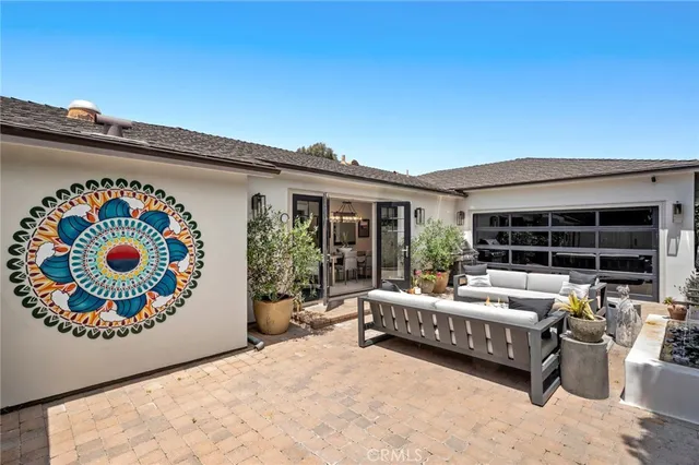 an aerial view of a house with a lake view