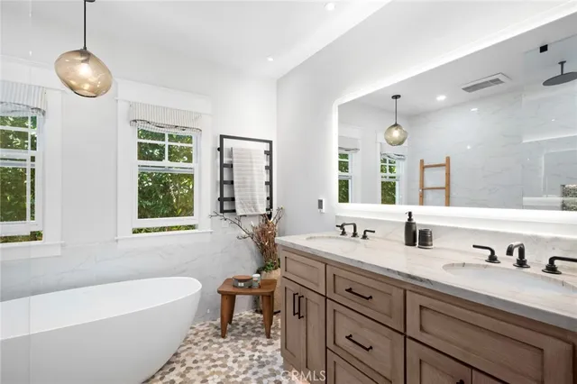 a patio with a patio table and chairs