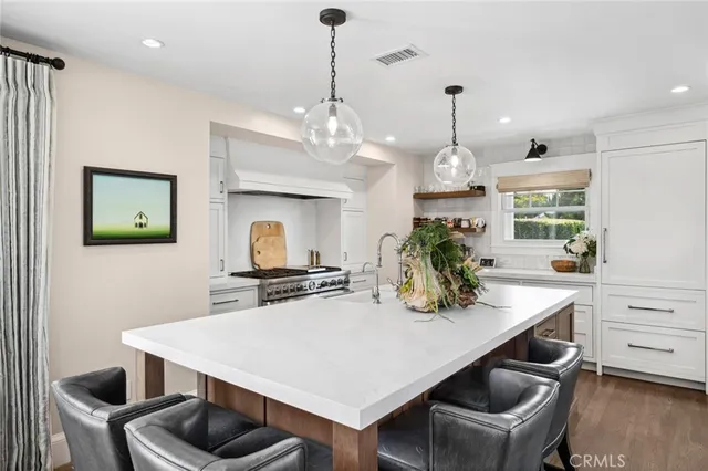 a view of kitchen and dining area with furniture