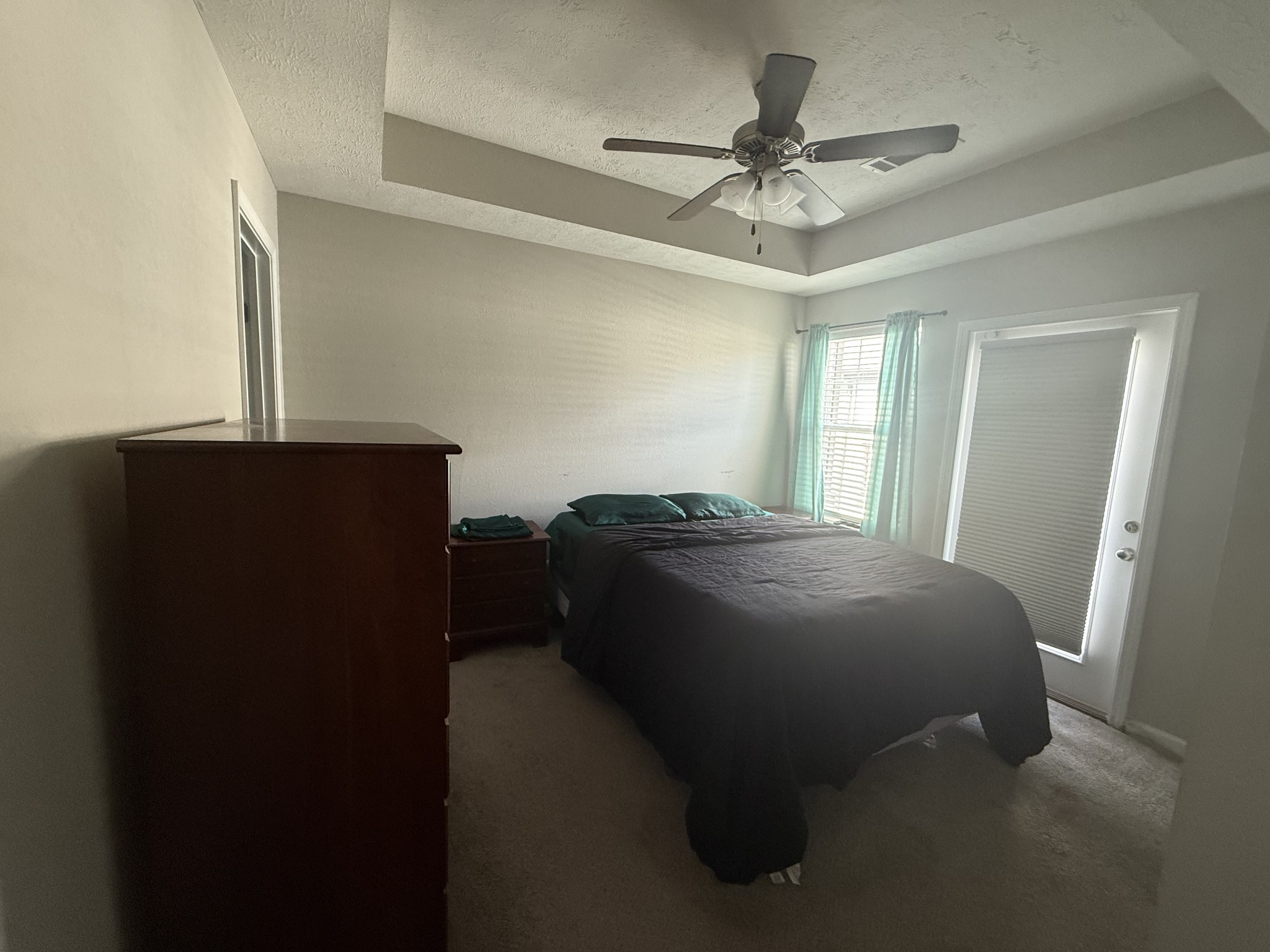 146 Ramsden Avenue La Vergne, TN 37086 - Photo 8 of 11 a bedroom with a bed and a ceiling fan