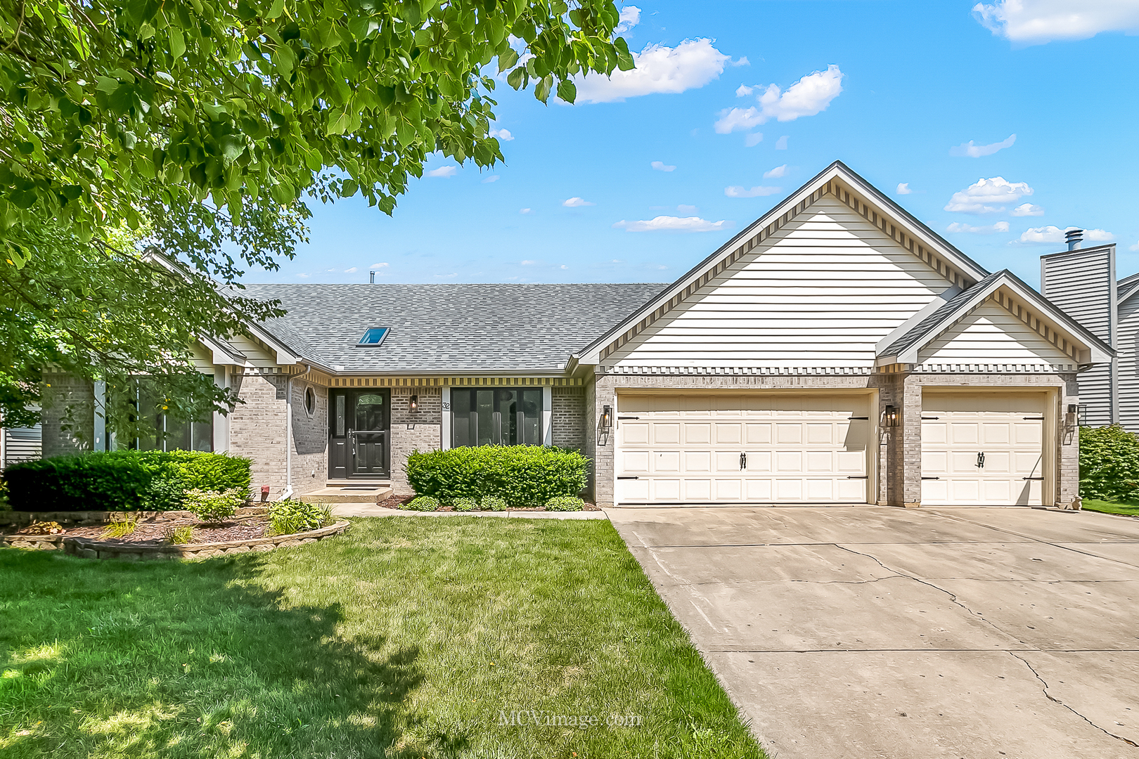 32 Robert Road Oswego, IL 60543 - Photo 1 of 33 a view of a house with yard and plants