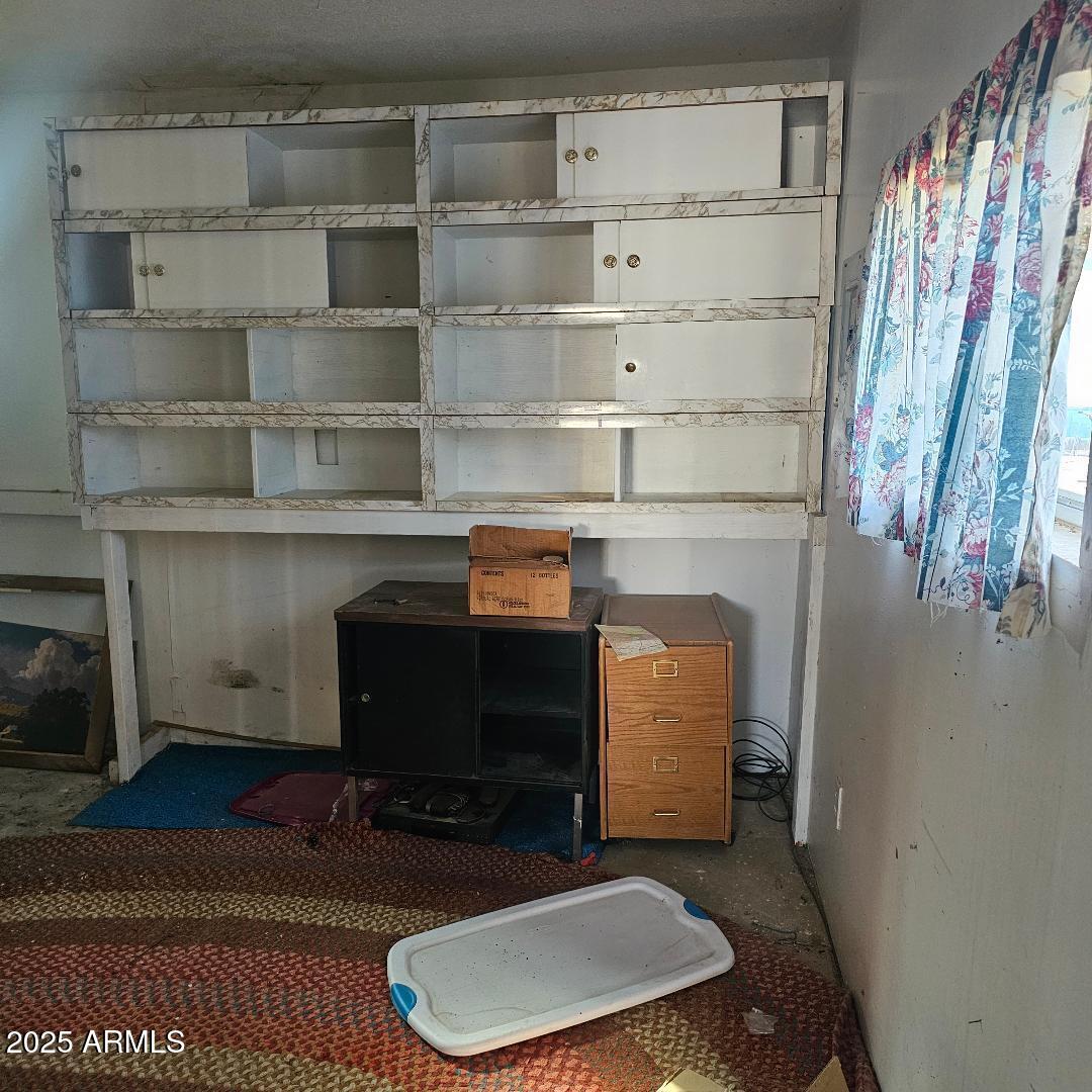 22855 Sunset Lane Congress, AZ 85332 - Photo 14 of 39 a room with furniture and a fireplace