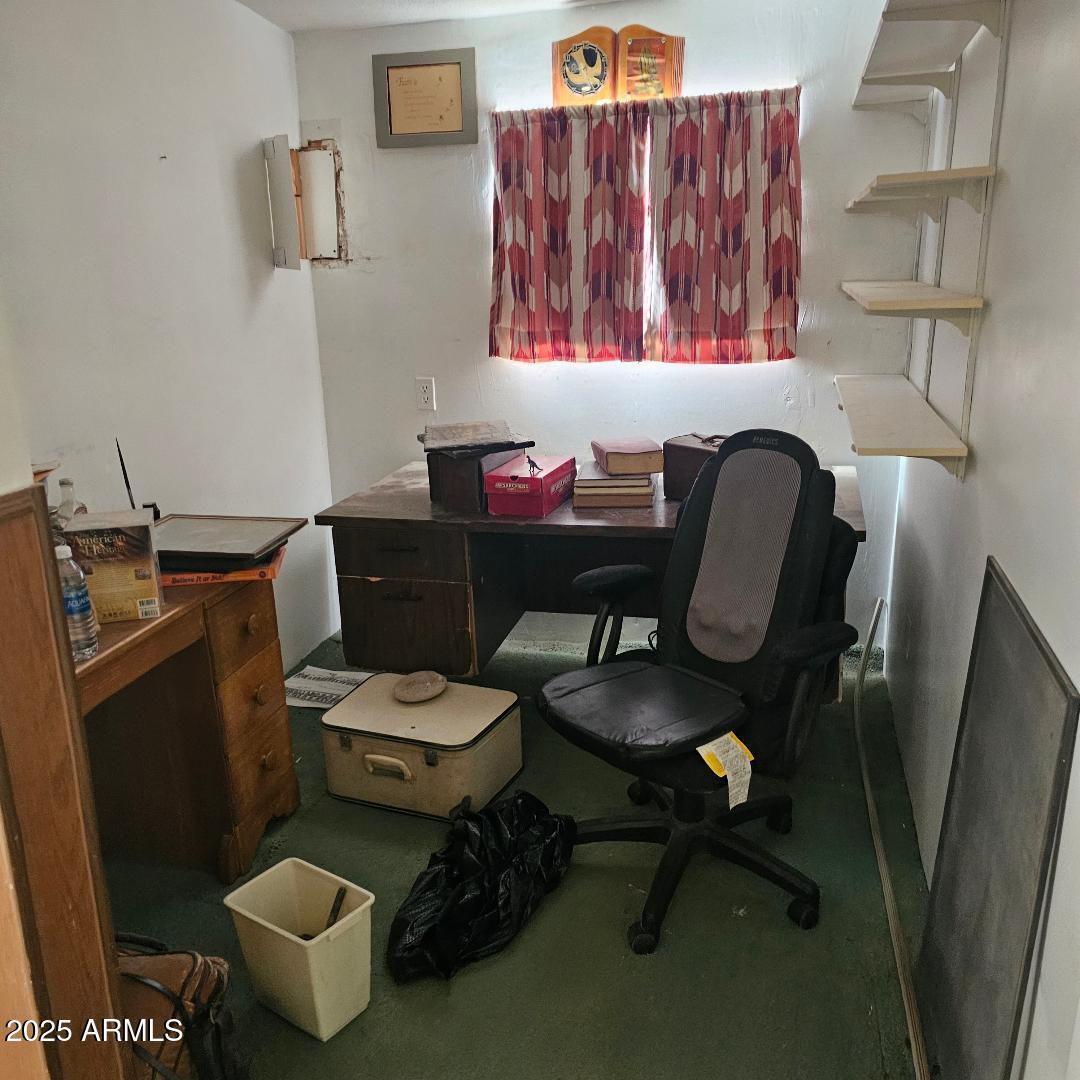 22855 Sunset Lane Congress, AZ 85332 - Photo 29 of 39 a view of a workspace with furniture and a window