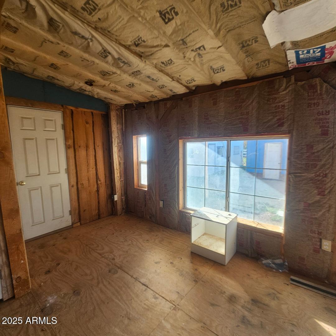 22855 Sunset Lane Congress, AZ 85332 - Photo 33 of 39 a view of an empty room with a window