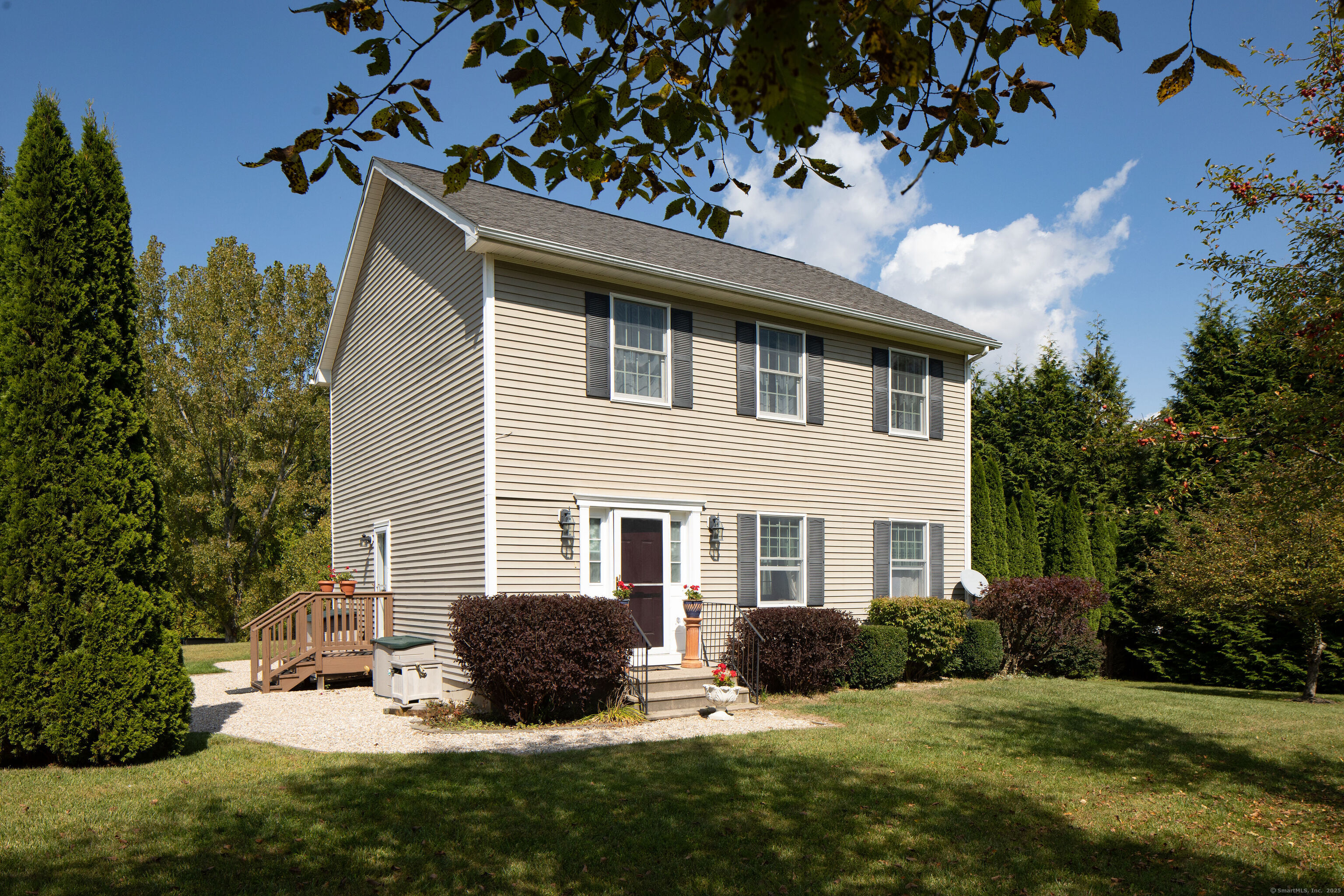 front view of a house with a yard