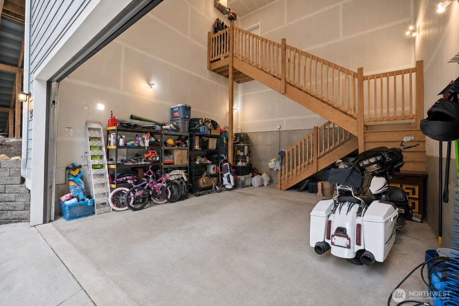 23 Spring Court Bellingham, WA 98229 - Photo 34 of 38 a view of a garage with a bike and car