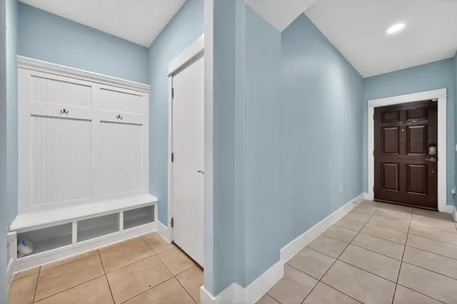 a view of a workspace with furniture