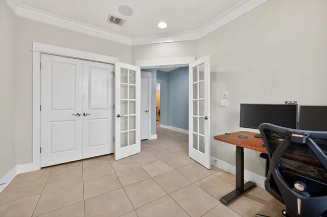 a workspace with furniture and window