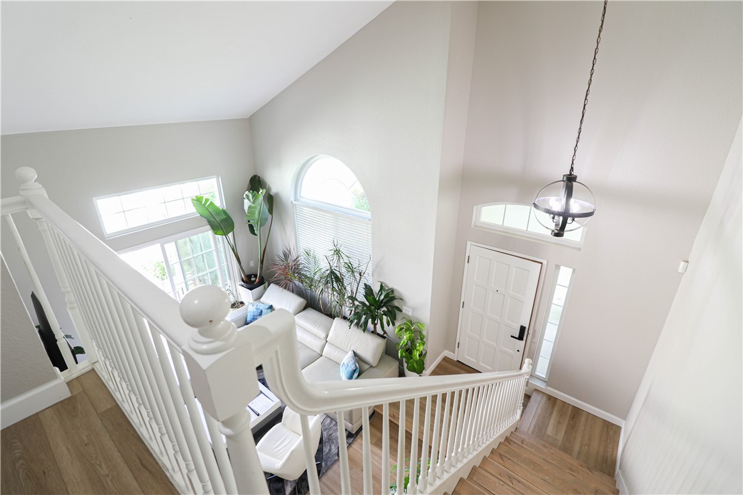 730 Breeze Hill Road, Unit 230 Vista, CA 92081 - Photo 27 of 40 a living room with furniture and wooden floor