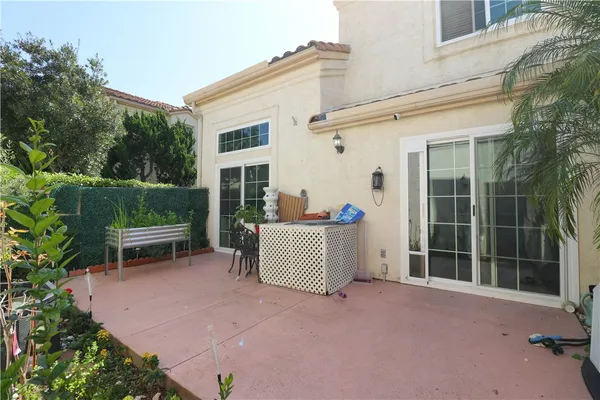 front view of a house with a garden