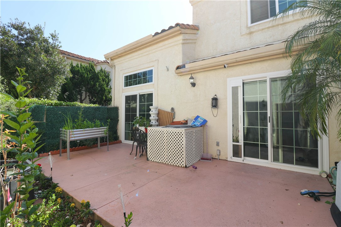 730 Breeze Hill Road, Unit 230 Vista, CA 92081 - Photo 32 of 40 front view of a house with a garden