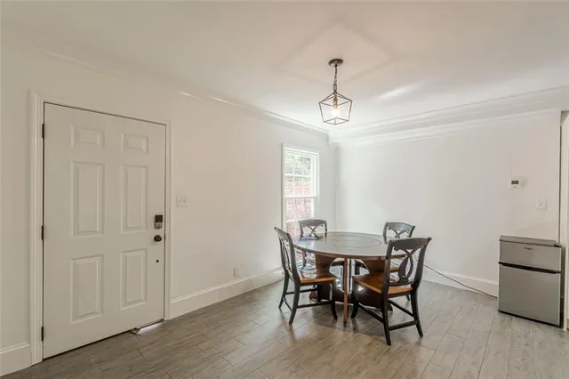 a kitchen with stainless steel appliances a refrigerator sink and stove