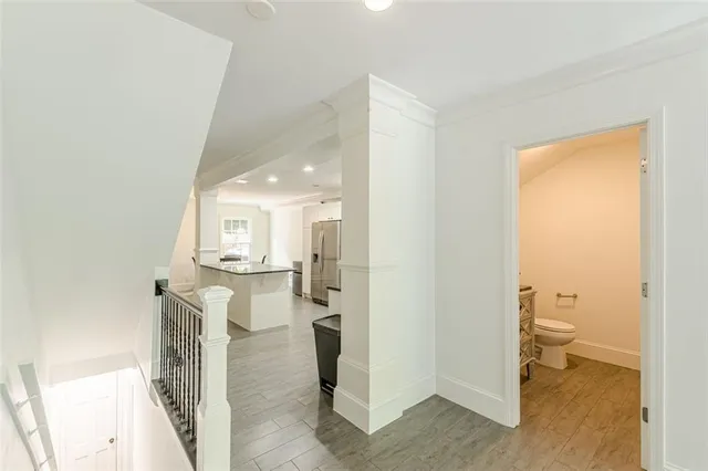 a view of a hallway with an entryway