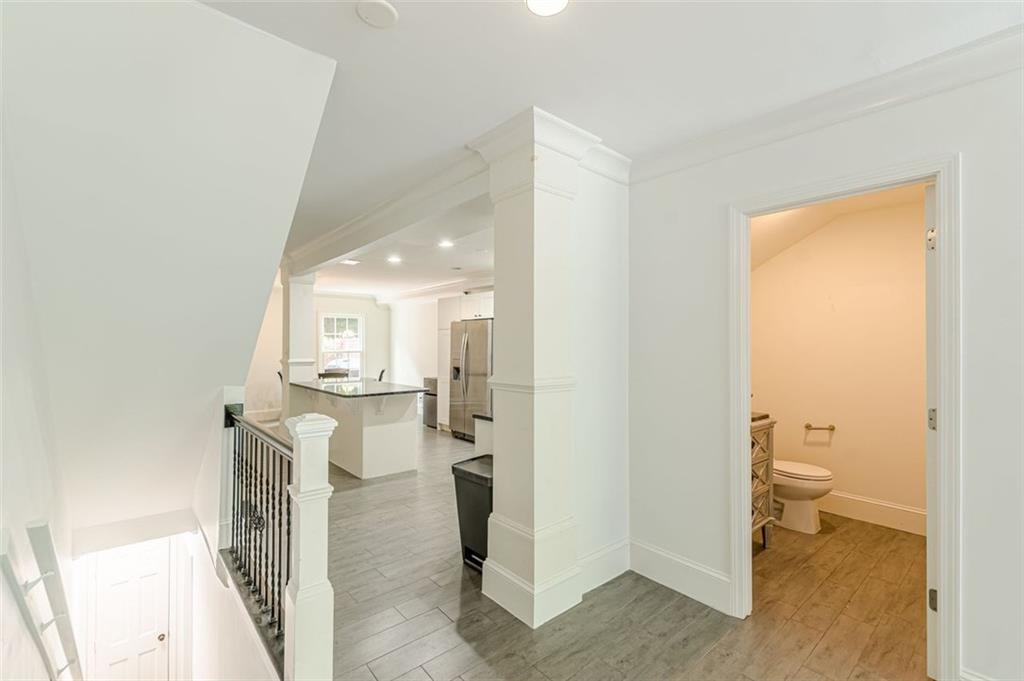 320 Alberta Terrace Northeast, Unit 3 Atlanta, GA 30305 - Photo 29 of 54 a bathroom with a sink and a toilet