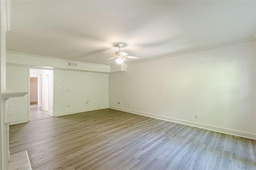 320 Alberta Terrace Northeast, Unit 3 Atlanta, GA 30305 - Photo 39 of 54 a view of an empty room with wooden floor