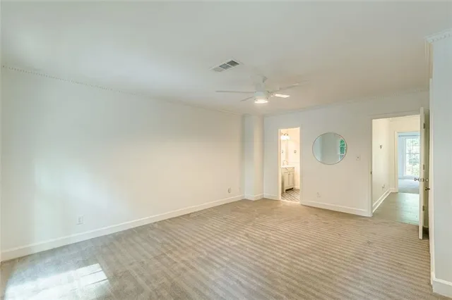 a bathroom with a shower and a toilet