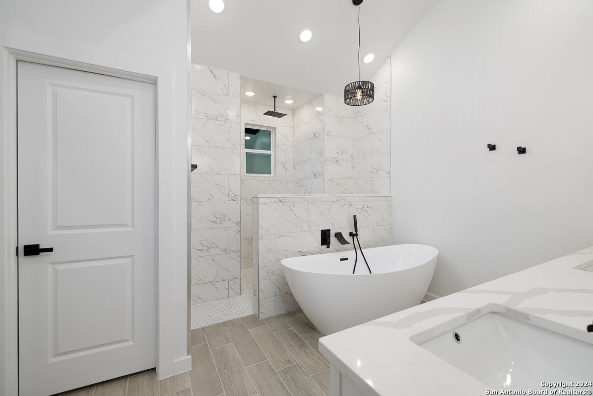 329 Blue Bonnet Breeze Spring Branch, TX 78070 - Photo 14 of 20 a spacious bathroom with a bathtub and shower
