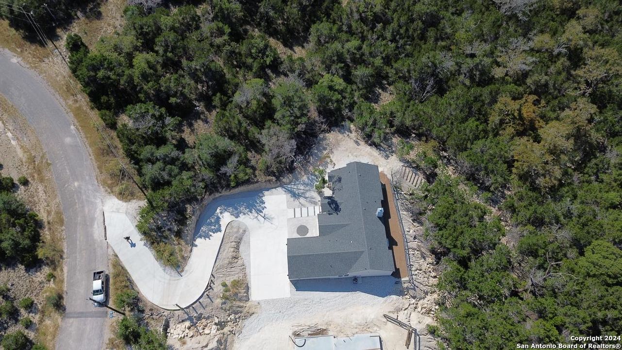 329 Blue Bonnet Breeze Spring Branch, TX 78070 - Photo 20 of 20 an aerial view of a house with outdoor space