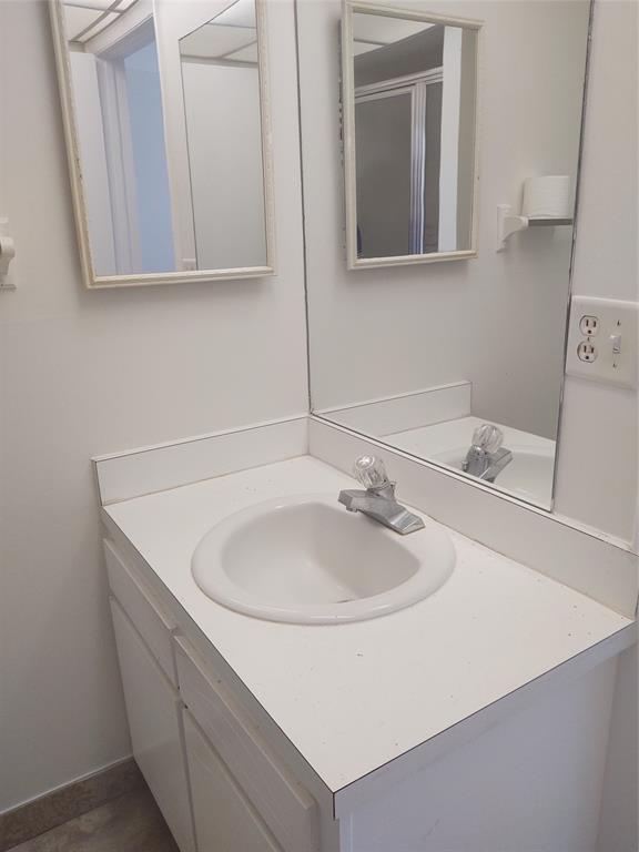 9 Royal Palm Way, Unit 201 Boca Raton, FL 33432 - Photo 13 of 21 a bathroom with a sink and a mirror