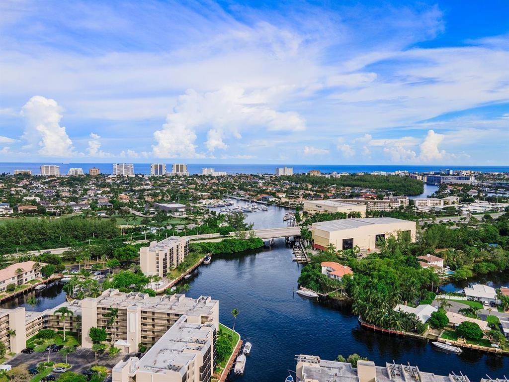 9 Royal Palm Way, Unit 201 Boca Raton, FL 33432 - Photo 17 of 21 a view of a lake with houses in the back