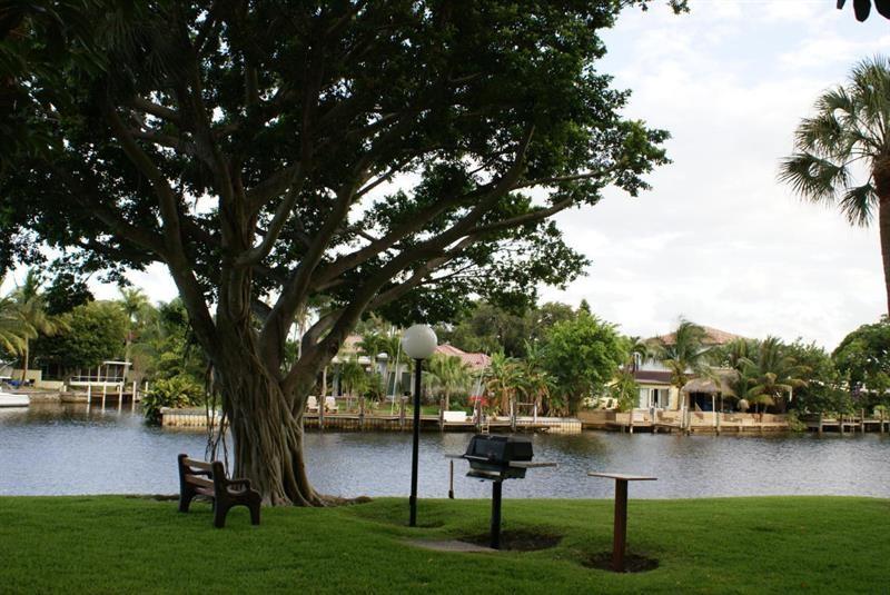 9 Royal Palm Way, Unit 201 Boca Raton, FL 33432 - Photo 21 of 21 a view of a lake with houses
